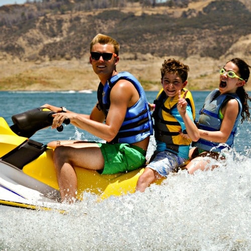 Campers and counselors jet skiing at Aloha Beach Camp Summer Camp in Hawaii